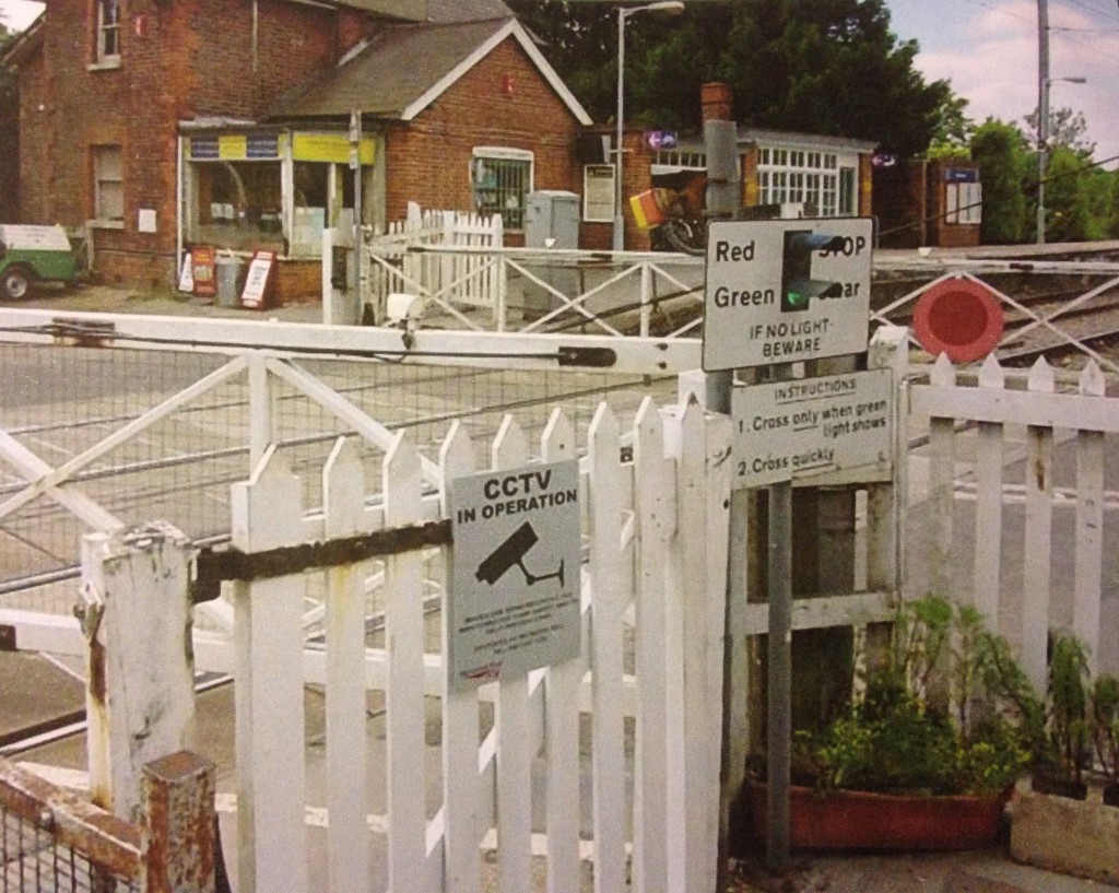 Elsenham's Up line wicket footpath crossing gate, with the bottom end of the Down platform in background