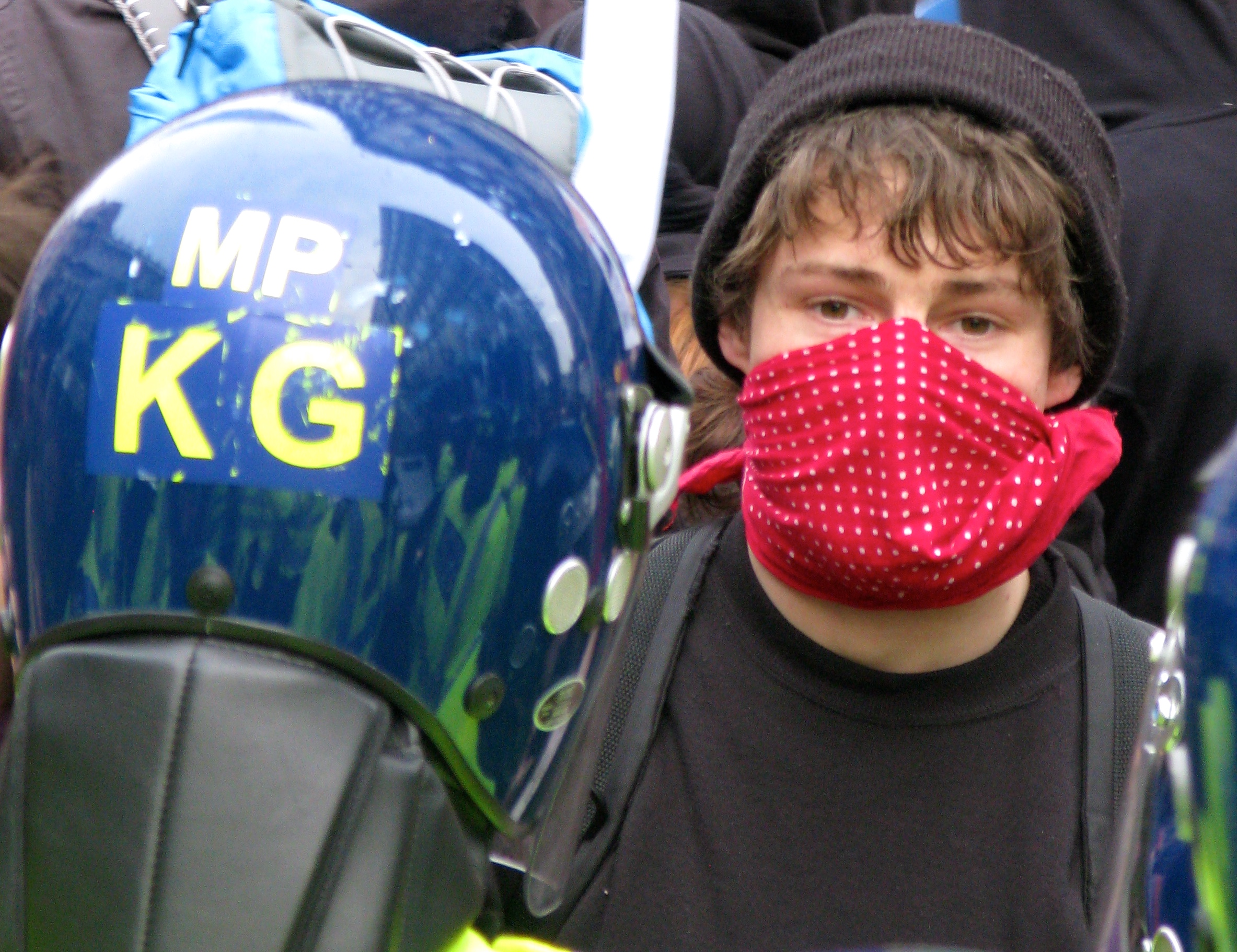 Protestor and Police Officer (© Paul Coleman, London Intelligence, 2011)