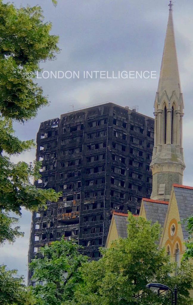 Church and Failed State: The spire of Notting Hill Methodist Church stands next to the charred Grenfell Tower remnant where a fire caused the deaths of 72 people on 14 June 2017 © Paul Coleman, London Intelligence ®