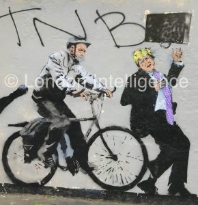 Graffiti art and graffiti near Regent Street in central London: The cycle of fortunes for London politicians. Jeremy Corbyn (Labour and left)and Boris Johnson (Conservative and right). © Paul Coleman, London Intelligence ®