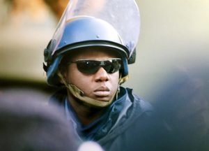 Seattle riot police position themselves between the WTO 1999 meeting and the protestors' blockade (© Paul Coleman, London Intelligence).